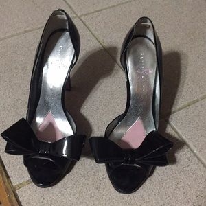 Paris Hilton patent leather heels.